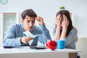 Bankruptcy Protection Lawyer Edmond, OK -couple looking at bills 